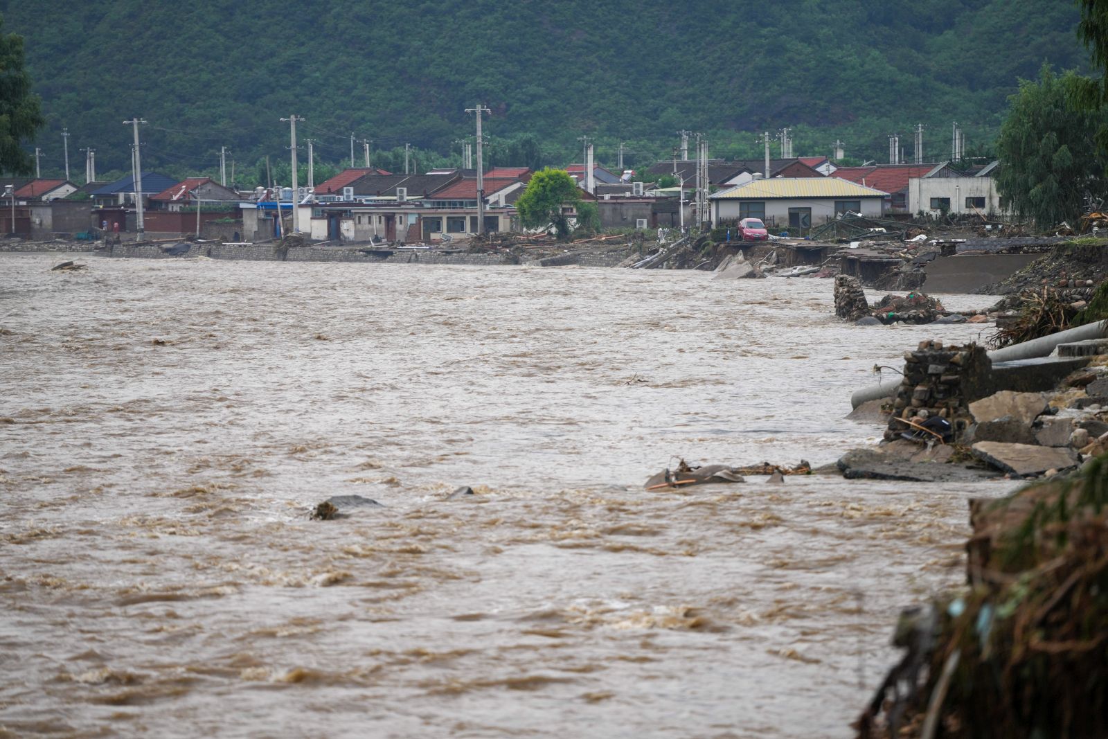 epa12265691 The river course in Xizhuangzi Village of Fengjiayu Town, Miyun District of Beijing, China, 27 July 2025. Beijing's suburban district of Miyun recorded average rainfall of 73.5 millimeters.  EPA/XINHUA / Ju Huanzong CHINA OUT / UK AND IRELAND OUT  /       MANDATORY CREDIT EDITORIAL USE ONLY