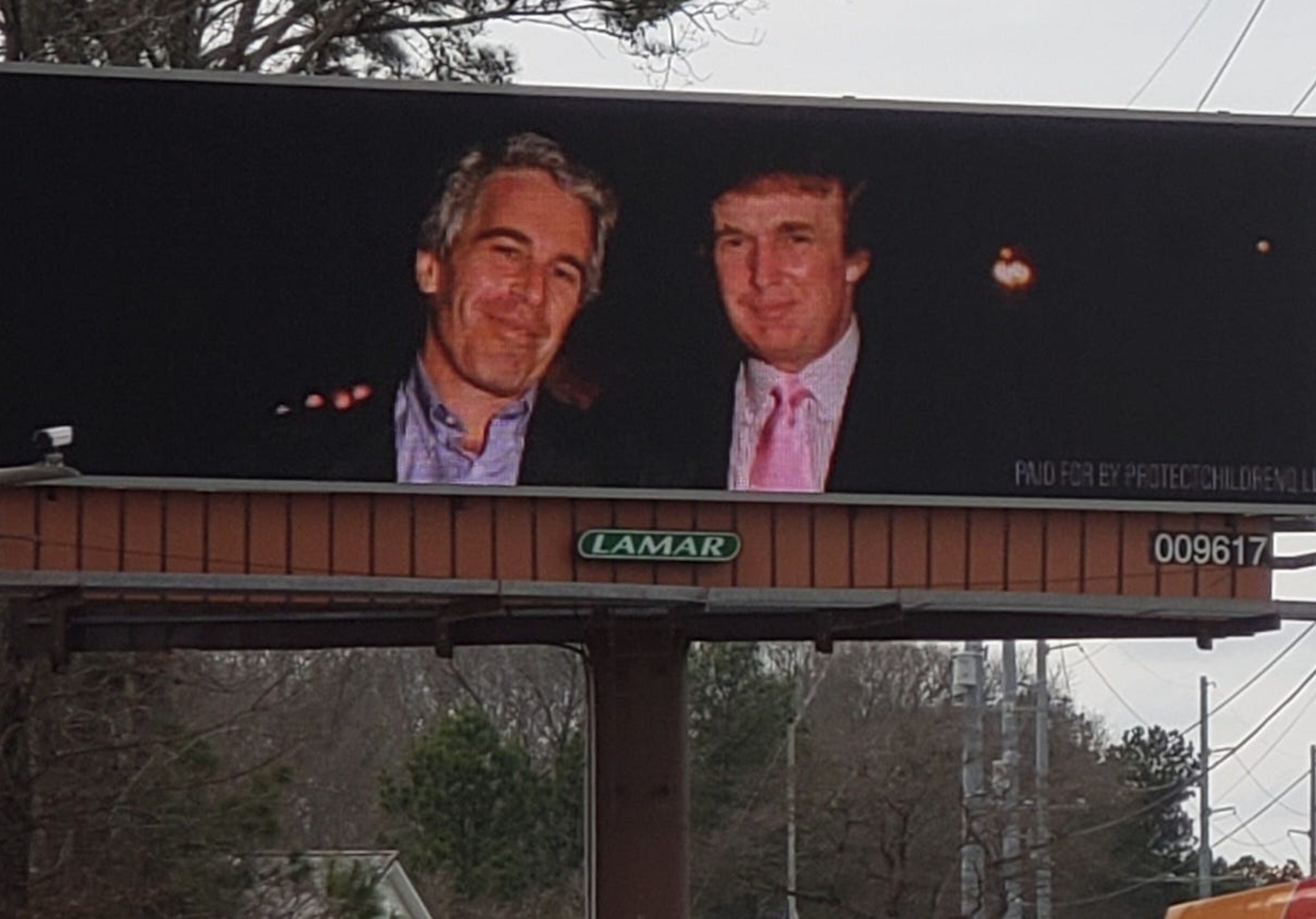 Electronic billboards featuring the images of Donald Trump and late sex trafficker Jeffrey Epstein have appeared in Fayetteville, North Carolina. (Photo by Myron B. Pitts / USA TODAY NETWORK / USA TODAY NETWORK via Imagn Images/Sipa USA) Photo: USA TODAY/SIPA USA