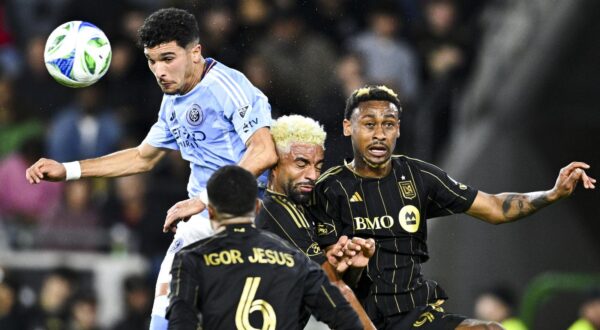 Mar 1, 2025; Los Angeles, California, USA; New York City FC forward Monsef Bakrar (9) battles for the header against  Los Angeles FC midfielder Timothy Tillman (11) and defender Nkosi Tafari (91) during the first half at BMO Stadium. Mandatory Credit: Kelvin Kuo-Imagn Images/Sipa USA Photo: Imagn Images/SIPA USA