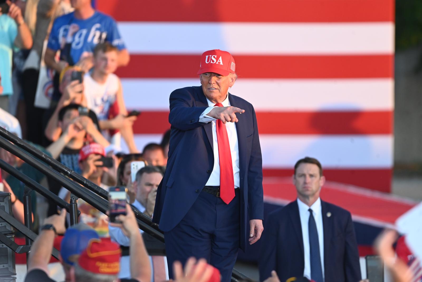 United States President Donald J Trump waves and gestures to the crowd following his speech at an America250 rally in Des Moines, Iowa, United States on July 3, 2025.  Credit: Kyle Mazza / UNF News via CNP/Sipa USA Photo: CNP/SIPA USA