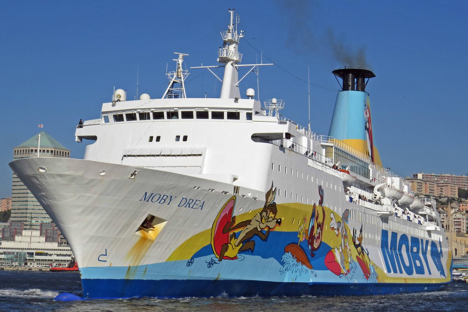 Symbolbild Fähre, Moby Drea, Moby Lines, Cartoon-Bemalung, mediterraner Raum, Passagierschiff, Transport, maritimer Verkehr, Schornstein, Küste, Italien, bunte Grafiken, Seeverkehr, Urlaub, Hafenstadt, Sommer, Reederei, Tourismus, Schifffahrt, mediterrane Fähren, Freizeit, Küstentransport, Fährenverbindung *** Symbolic image ferry, Moby Drea, Moby Lines, cartoon painting, mediterranean area, passenger ship, transport, maritime traffic, funnel, coast, Italy, colorful graphics, maritime traffic, vacation, port city, summer, shipping company, tourism, shipping, mediterranean ferries, leisure, coastal transport, ferry connection Copyright: xHans-JuergenxAmbergx Photo: IMAGO/Hans-Juergen Amberg/IMAGOSTOCK&PEOPLE