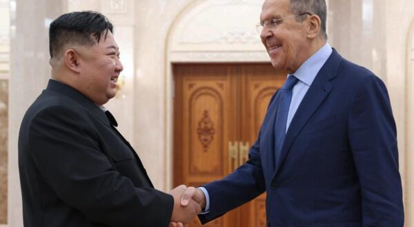 NORTH KOREA, PYONGYANG - OCTOBER 19, 2023: Russia's Foreign Minister Sergei Lavrov (R) and North Korean leader Kim Jong-un shake hands during a meeting. Russian Foreign Ministry/TASS/Sipa USA Photo: Tass/SIPA USA