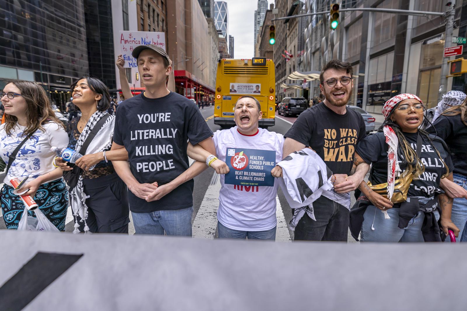 NEW YORK, NEW YORK - APRIL 22: Climate activists block the street outside U.S. billionaire Bill Ackman's Manhattan residence during "Bye Bye Billionaires Block Party" protest on Earth Day?, April 22, 2025? in New York City. (Photo by Michael Nigro/Sipa USA) Photo: Michael Nigro/SIPA USA