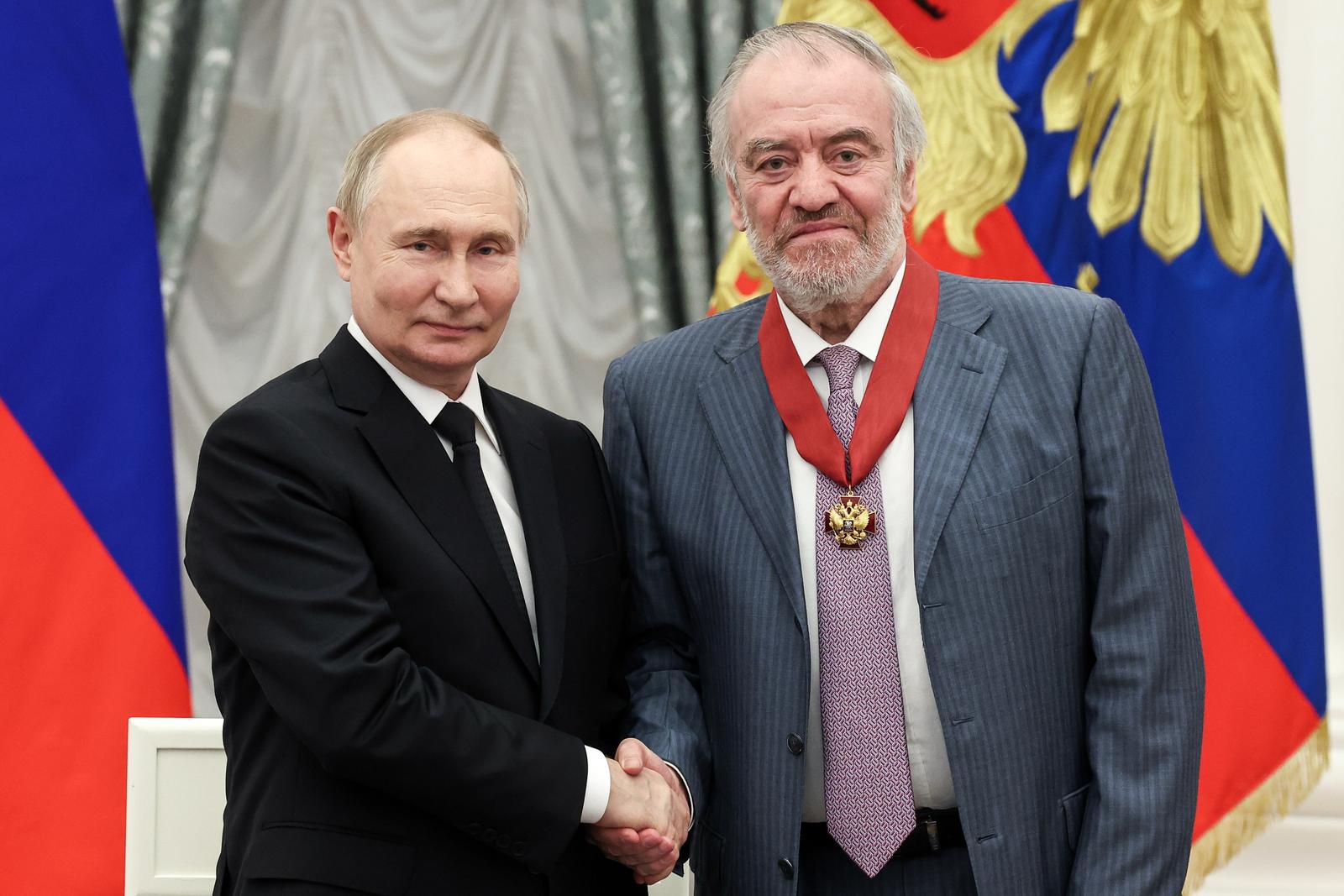 RUSSIA, MOSCOW - MAY 30, 2024: Russia's President Vladimir Putin awards the Order for Merits to the Fatherland 2nd class to Valery Gergiev, artistic director, general director at Mariinsky Theatre and general director at Bolshoi Theatre, during a ceremony in St Catherine Hall of the Moscow Kremlin. Valery Sharifulin/POOL/TASS/Sipa USA Photo: Tass/SIPA USA