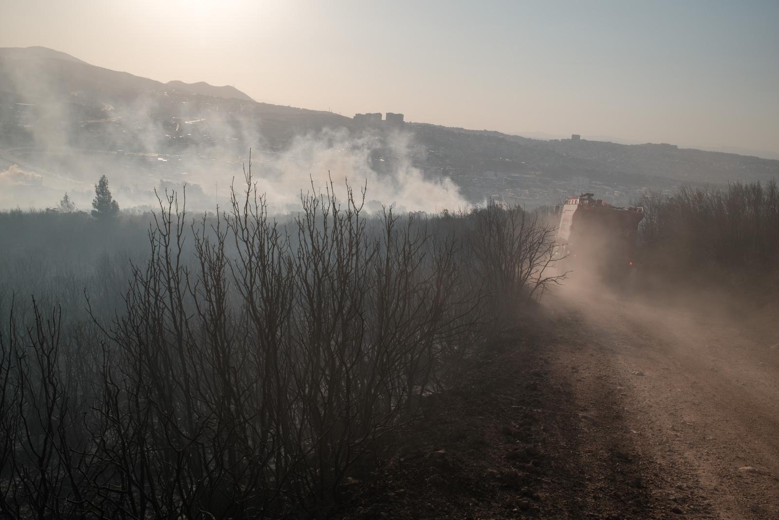 A view of an area burned by the forest fire. Forest fires broke out in many parts of Izmir, covering the city with smoke. The fires, which have been growing with the effect of the wind for days, also spread to Gaziemir, one of the central districts of the city. Many vehicles were burned in the fire that spread to the industrial zone. People say the response to the fire is inadequate. (Photo by Murat Kocabas / SOPA Images/Sipa USA) Photo: SOPA Images/SIPA USA