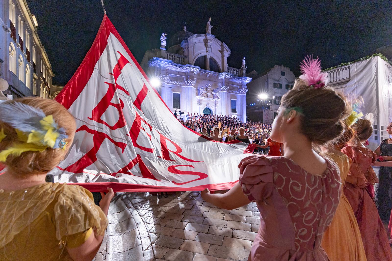 10.07.2025., Crkva svetog Vlaha, Dubrovnik - Podizanjem zastave Libertas uz stihove "Himne slobodi" ispred crkve sv. Vlaha otvorene su 76. Dubrovacke ljetne igre.
 Photo: Grgo Jelavic/PIXSELL