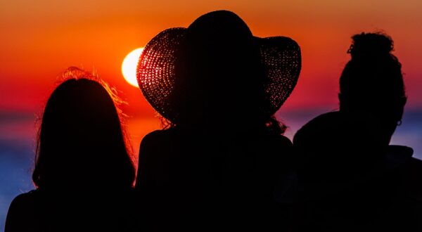 27.07.2024., Vela Luka - Pogled na zalazak sunca promatran s trajekta Korcula koji prometuje na liniji Split - Vela Luka. Photo: Zvonimir Barisin/PIXSELL