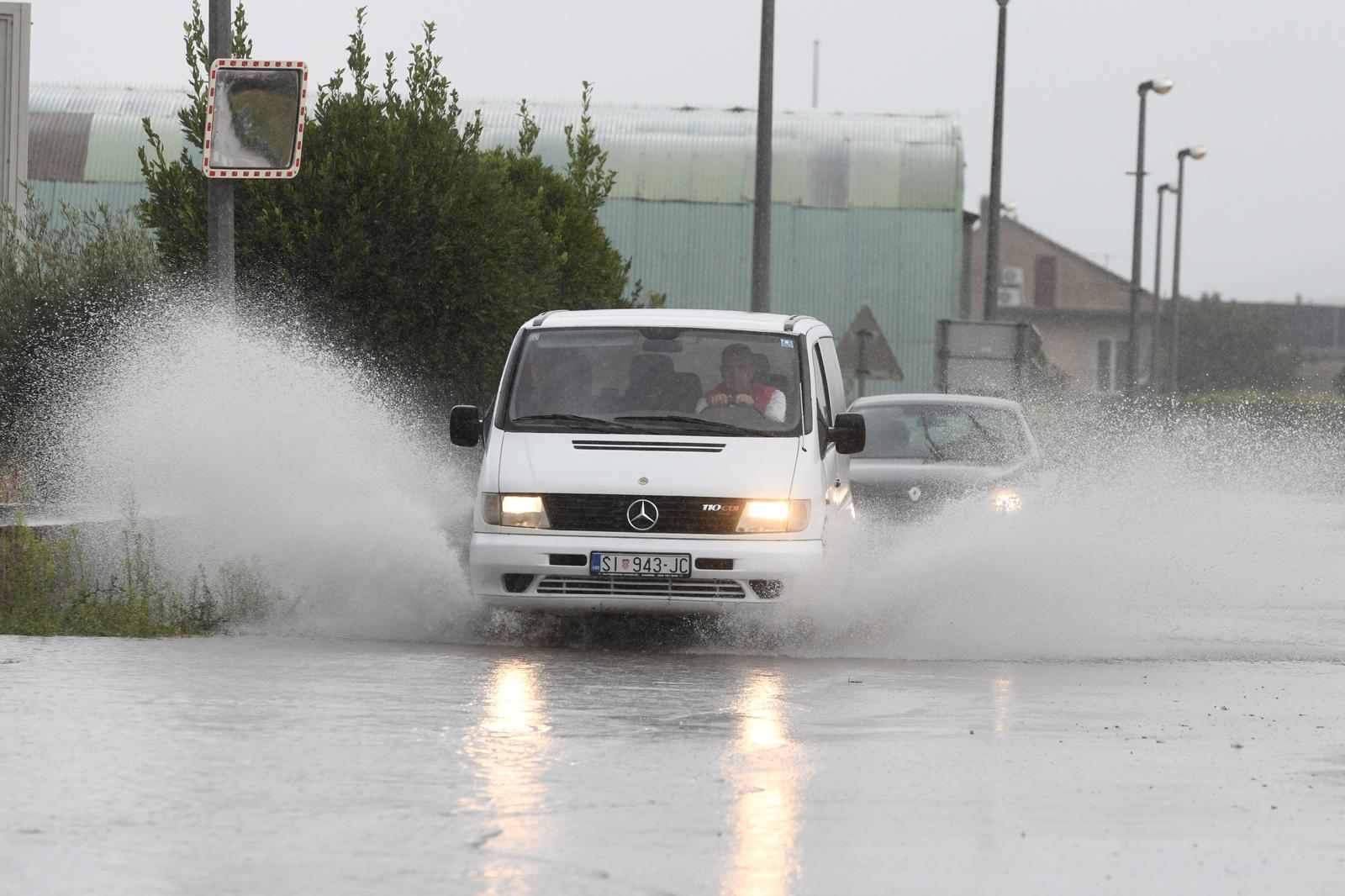 29.08.2023., Sibenik - Obilne kise u sibenskom zaledju otezavaju i promet na lokalnim prometnicama. Photo: Hrvoje Jelavic/PIXSELL