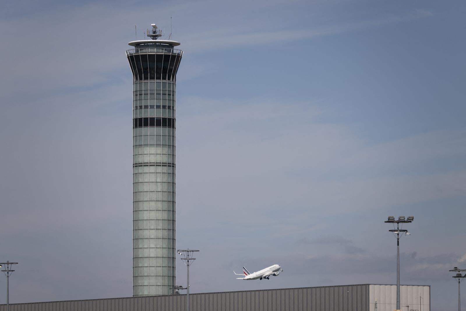 An Air France airliner takes off behind the control tower at Roissy-Charles de Gaulle airport in Roissy-en-France, north of Paris, on April 23, 2024. A strike by air traffic controllers this Thursday (April 25) has not been called off, as the airport authorities hoped, making the outlook of hundreds of flight cancellations probable. Negotiations between unions and France’s civil aviation authority (Direction générale de l'aviation civile, DGAC) regarding changes to their job role have broken down. Photo by Eliot Blondet/ABACAPRESS.COM Photo: Blondet Eliot/ABACA/ABACA