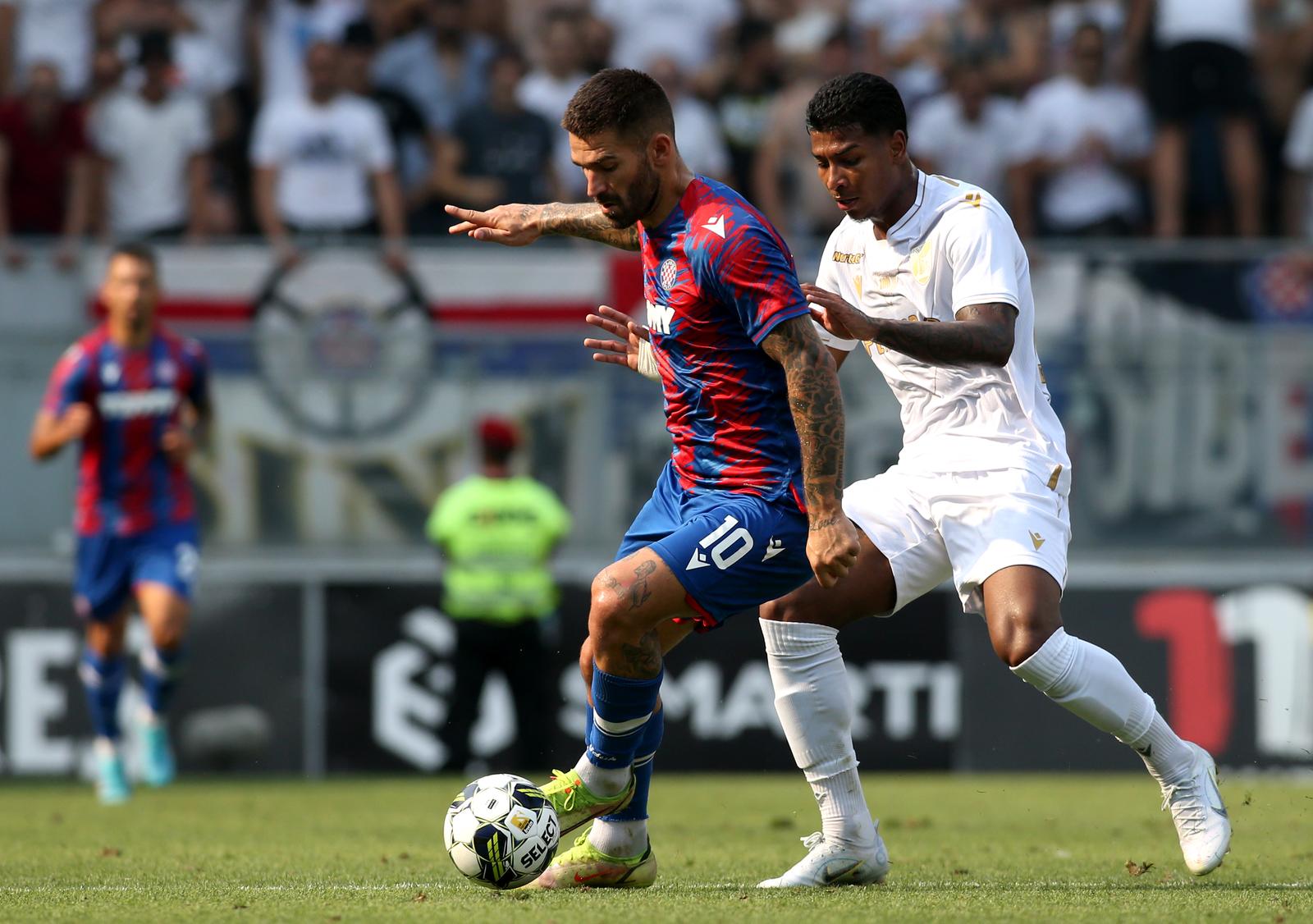 GUIMARAES, PORTUGAL - AUGUST 10: Marko Livaja of HNK Hajduk Split competes for the ball with Matheus Pains of Vitoria SC ,during the UEFA Europa Conference League 2022/23 Third Qualifying Round Second Leg match between Vitoria SC v HNK Hajduk Split at Estadio D. Afonso Henriques on August 10, 2022 in Guimaraes, Portugal. (Photo by MB Media) Photo: MB Media/WORLD BY PIXSELL