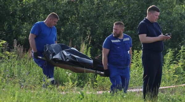 RUSSIA, MOSCOW REGION - JULY 7, 2025: A security service employee is seen as funeral service employees carry the body of former Russian Transport Minister Roman Starovoit. According to the Russian Investigative Committee, the body of Roman Starovoit with a gunshot wound was found in his car, the main version is suicide.  Sergei Savostyanov/TASS/Sipa USA Photo: Tass/SIPA USA
