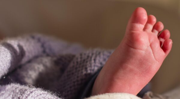EMBARGOED TO 0001 MONDAY MAY 12 Undated file photo of the foot of a baby sleeping in a basket. An NHS programme to prevent brain injuries during childbirth is set to be rolled out across the country. The Avoiding Brain Injuries in Childbirth (ABC) programme will assist maternity staff to better identify signs that the baby is in distress during labour so they can act quickly, the Department of Health and Social Care (DHSC) said. Issue date: Monday May 12, 2025. Photo: Dominic Lipinski/PRESS ASSOCIATION
