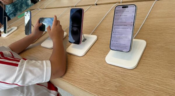 General view of Apple iPhones on display at a retail store in Miami, Florida. 
 Apple CEO Tim Cook has announced a $100 billion increase in the companys investment in the United States. The announcement comes shortly after President Trump stated on Wednesday that he plans to impose 100% tariffs on tens of billions of dollars worth of imported semiconductors used in consumer electronics and other products. Trump noted that companies committing to manufacturing chips within the U.S. would be exempt from the tariffs. Most Apple chips are made in Taiwan. Aug. 7, 2025 in Miami, Florida. (Photo by Michele Eve Sandberg/Sipa USA) Photo: MICHELE EVE SANDBERG/SIPA USA