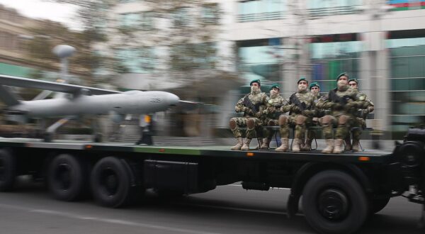 BAKU, AZERBAIJAN - DECEMBER 8, 2020: Azerbaijani servicemen are seen by a Elbit Hermes 450 unmanned aerial vehicle designed for tactical long endurance missions by Israel Aircraft Industries during a rehearsal of a military parade in Freedom Square. The parade to mark the end of the military conflict over the disputed Caucasus Mountains territory of Nagorno-Karabakh is scheduled for December 10. Valery Sharifulin/TASS Photo via Newscom Newscom/PIXSELL