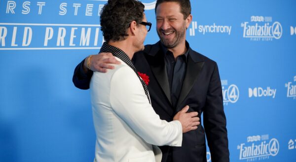 Pedro Pascal, left, and Ebon Moss-Bachrach arrive at the premiere of "The Fantastic Four: First Steps" on Monday, July 21, 2025, at Dorothy Chandler Pavilion in Los Angeles. (Photo by Jordan Strauss/Invision/AP) LA Premiere of "The Fantastic Four: First Steps"