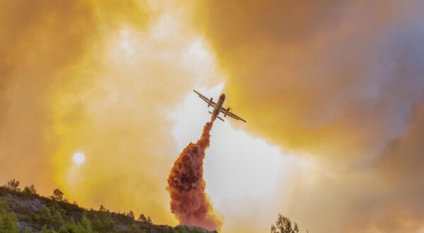 A wildfire raging in the department of Aude in the south of France, on August 6, 2025. Leaving August 5, 2025, afternoon from the village of Ribaute, between Carcassonne and Narbonne, the largest wildfire of the summer in France ravaged 16,000 hectares of vegetation and pine forest by August 6, 2025, evening, "more than the city of Paris," according to a French colonel. It also destroyed or damaged 25 homes and burned 35 vehicles, according to the provisional report from the prefecture. Photo by Marc-Olivier Chataignier/ABACAPRESS.COM Photo: ABACA/ABACA