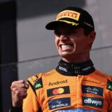 epa12281932 First placed McLaren driver Lando Norris of Britain celebrates on the podium after the Formula 1 Hungarian Grand Prix at the Hungaroring racetrack in Mogyorod near Budapest, Hungary, 03 August 2025.  EPA/ANNA SZILAGYI