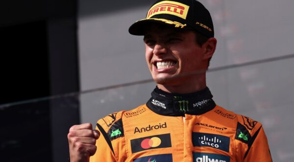 epa12281932 First placed McLaren driver Lando Norris of Britain celebrates on the podium after the Formula 1 Hungarian Grand Prix at the Hungaroring racetrack in Mogyorod near Budapest, Hungary, 03 August 2025.  EPA/ANNA SZILAGYI
