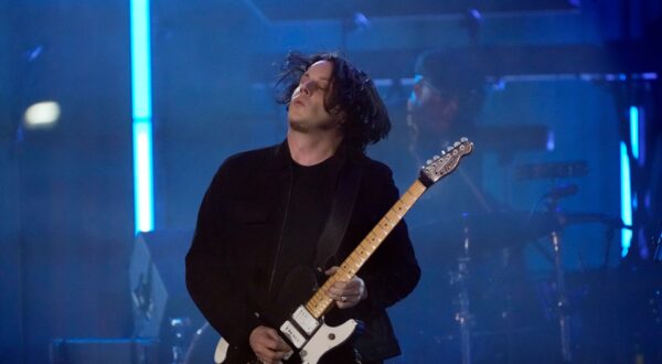 Jack White performs during a concert celebrating the historic reopening of a an 18-story structure that long had symbolized their hometown's decline. Diana Ross, Eminem and White took part in Thursday night's event called 