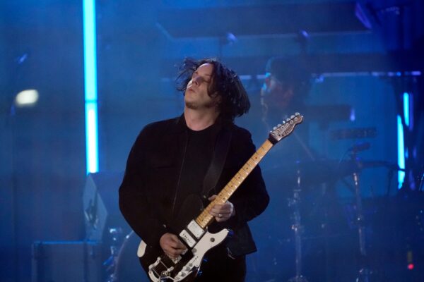 Jack White performs during a concert celebrating the historic reopening of a an 18-story structure that long had symbolized their hometown's decline. Diana Ross, Eminem and White took part in Thursday night's event called 