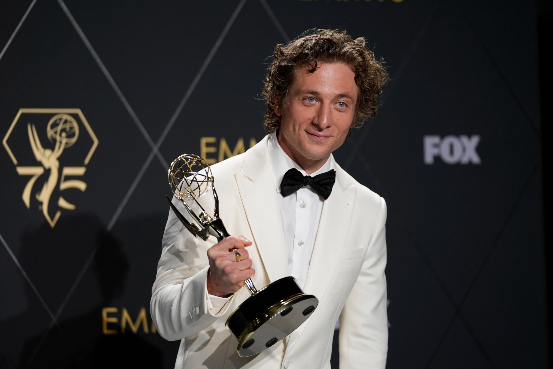 Jeremy Allen White, winner of the award for outstanding lead actor in a comedy series for "The Bear," poses in the press room during the 75th Primetime Emmy Awards on Monday, Jan. 15, 2024, at the Peacock Theater in Los Angeles. (AP Photo/Ashley Landis) 75th Primetime Emmy Awards - Press Room