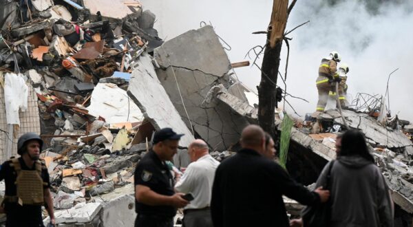 Firefighters put out fires on the ruins of a section of a nine-storey apartment block in the Sviatoshynskyi district destroyed by the Russian missile and drone attack on Kyiv, July 31, 2025. Six people have died in the capital, including a six-year-old boy and his mother, and dozens of people are injured. Photo by Danylo Antoniuk/Ukrinform/ABACAPRESS.COM Photo: Ukrinform/ABACA/ABACA