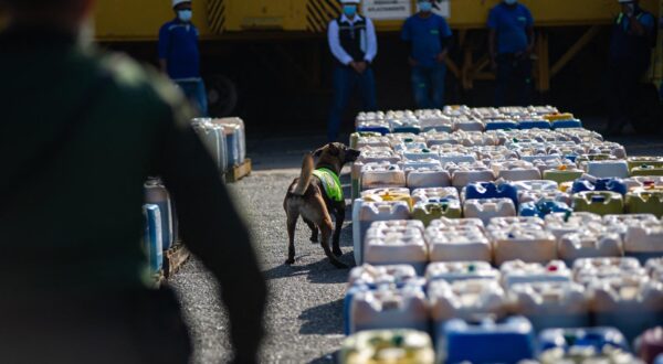 Members of Colombia's anti-narcotics police seize a cargo of molasses mixed with cocaine that was being sent to Valencia in Spain at the Ship Cargo terminal in Cartagena, Colombia on February 4, 2022. The drug cargo is pressumed to be sent by the Gulf Clan 'Clan del Golfo' Photo by Sebastian Barros Salamanca/Long Visual Press/ABACAPRESS.COM