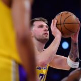 Apr 30, 2025; Los Angeles, California, USA; Los Angeles Lakers guard Luka Doncic (77) shoots a free throw against the Minnesota Timberwolves during the first half in game five of first round for the 2025 NBA Playoffs at Crypto.com Arena. Mandatory Credit: Gary A. Vasquez-Imagn Images/Sipa USA Photo: Imagn Images/SIPA USA