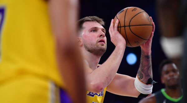 Apr 30, 2025; Los Angeles, California, USA; Los Angeles Lakers guard Luka Doncic (77) shoots a free throw against the Minnesota Timberwolves during the first half in game five of first round for the 2025 NBA Playoffs at Crypto.com Arena. Mandatory Credit: Gary A. Vasquez-Imagn Images/Sipa USA Photo: Imagn Images/SIPA USA