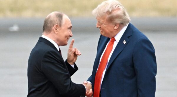 Russian President Vladimir Putin (left) and U.S. President Donald Trump (right) on the airfield at Elmendorf-Richardson Air Force Base.
Credit: Dmitry Azarov/Kommersant Photo/Sipa USA Photo: Kommersant Photo Agency/SIPA USA