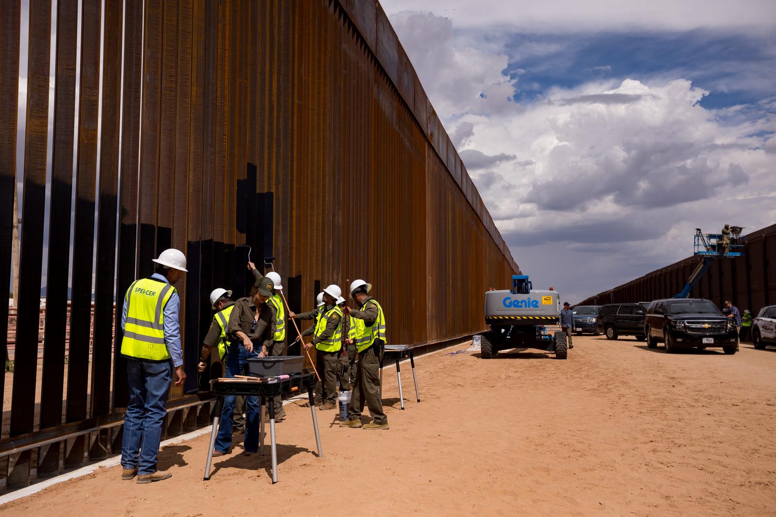 Homeland Security Secretary Kristi Noem paints the steel border wall black after a news conference with the El Paso Sector in Santa Teresa, N.M., on Tuesday, Aug. 19, 2025. She announced the entire structure will be painted black. (Photo by Gaby Velasquez / El Paso Times / USA TODAY NETWORK via Imagn Images/Sipa USA) Photo: USA TODAY/SIPA USA
