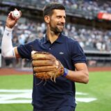 Aug 21, 2025; Bronx, New York, USA;  Professional tennis player Novak Djokovic prepares to throw out the first pitch prior to the game between the Boston Red Sox and the New York Yankees at Yankee Stadium. Mandatory Credit: Wendell Cruz-Imagn Images/Sipa USA 
  Photo: Imagn Images/SIPA USA