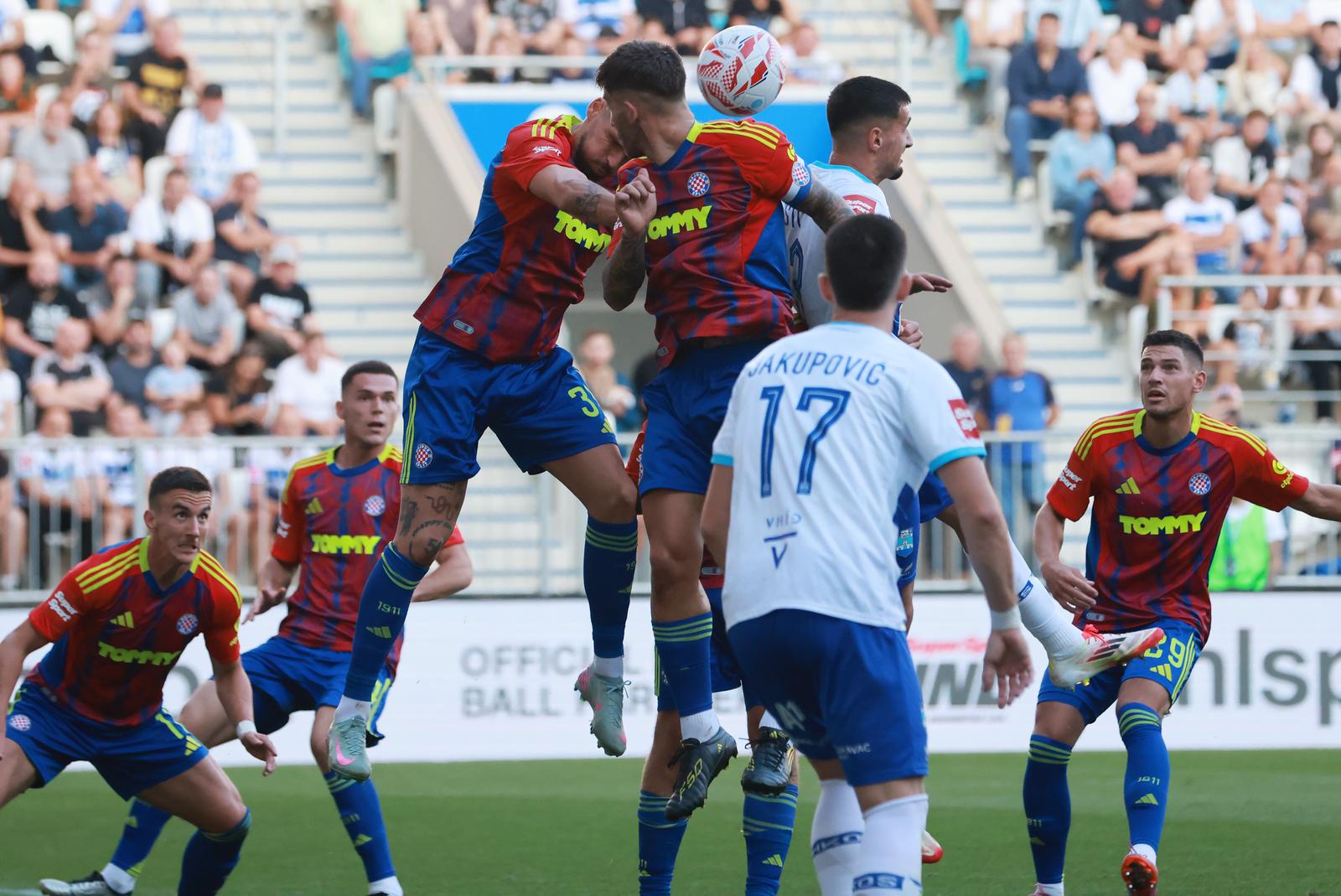 24.08.2025., stadion Opus Arena, Osijek - SuperSport HNL, 04. kolo, NK Osijek - HNK Hajduk. Zvonimir Sarlija i Emin Hasic Photo: Davor Javorovic/PIXSELL