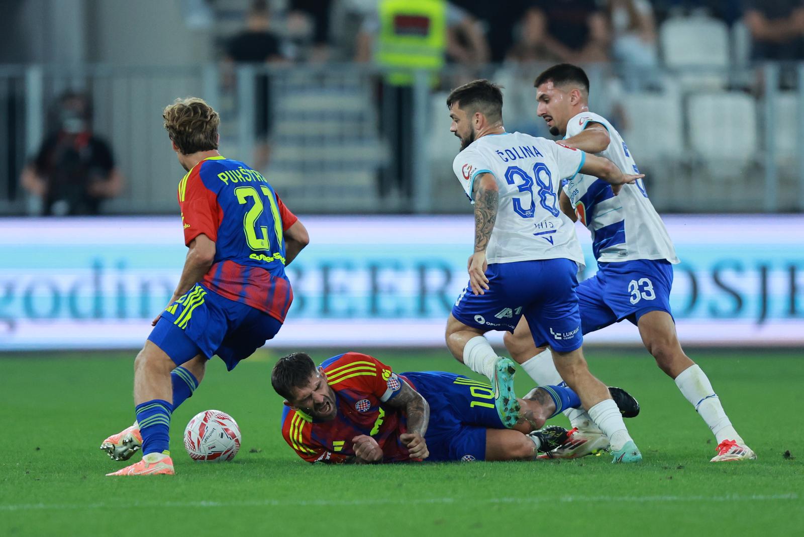 24.08.2025., stadion Opus Arena, Osijek - SuperSport HNL, 04. kolo, NK Osijek - HNK Hajduk. Rokas Pukstas, Marko Livaja, David Colina i Emin Hasic Photo: Davor Javorovic/PIXSELL