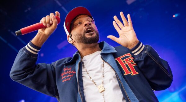 12 July 2025, Lower Saxony, Wolfsburg: US actor, film producer and rapper Will Smith takes to the stage during his concert at the Autostadt summer festival. Photo: Moritz Frankenberg/dpa Photo: Moritz Frankenberg/DPA
