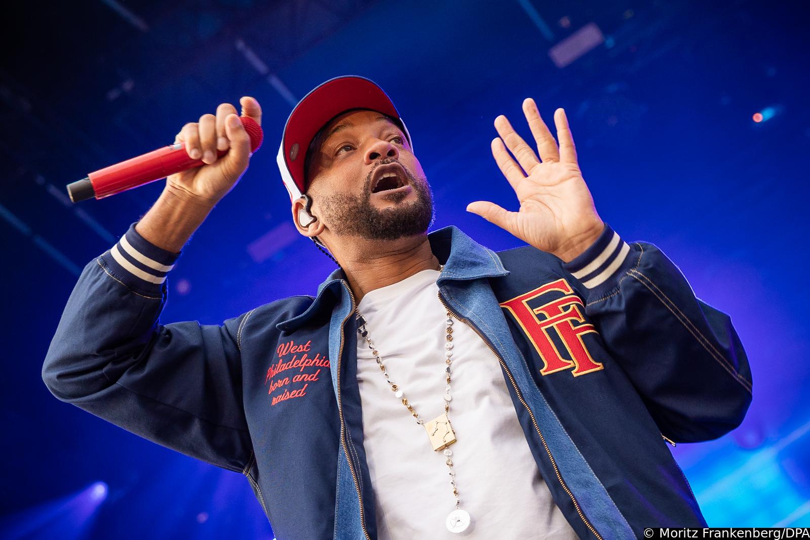 12 July 2025, Lower Saxony, Wolfsburg: US actor, film producer and rapper Will Smith takes to the stage during his concert at the Autostadt summer festival. Photo: Moritz Frankenberg/dpa Photo: Moritz Frankenberg/DPA