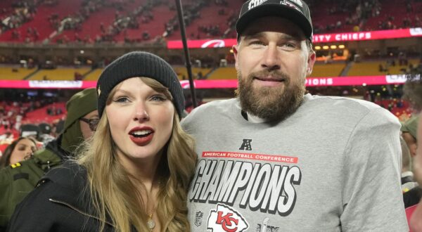 Kansas City Chiefs tight end Travis Kelce and his girlfriend entertainer Taylor Swift stand on the field after the Chiefs defeated the Buffalo Bills 32-29 in the AFC Championship Game at Arrowhead Stadium in Kansas City, Missouri, on Sunday, January 26, 2025. The Chiefs will meet the Philadelphia Eagles in Super Bowl LIX in New Orleans on February 9. Photo by Jon Robichaud/UPI. Photo via Newscom Photo: Jon Robichaud/NEWSCOM