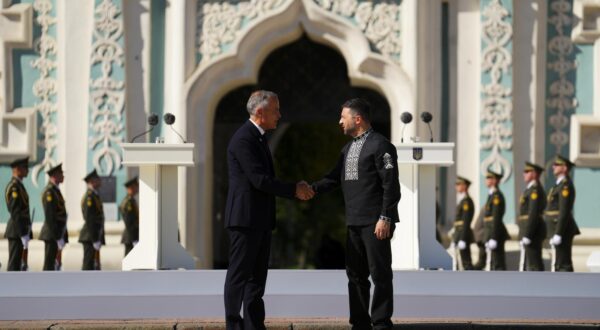 Prime Minister Mark Carney and Ukrainian President Volodymyr Zelenskyy shake hands as they take part in a ceremony on Independence Day in Sophia Square in Kyiv, Ukraine, on Sunday, Aug. 24, 2025. THE CANADIAN PRESS/Sean Kilpatrick Photo: Sean Kilpatrick/PRESS ASSOCIATION