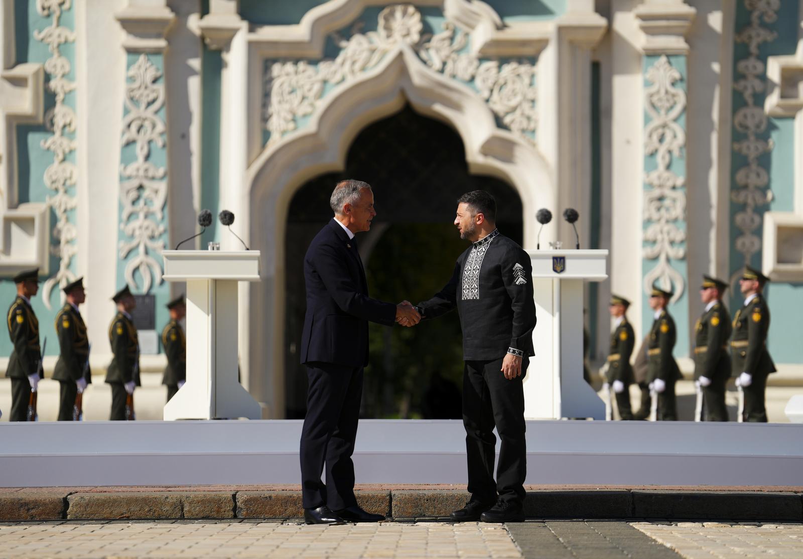 Prime Minister Mark Carney and Ukrainian President Volodymyr Zelenskyy shake hands as they take part in a ceremony on Independence Day in Sophia Square in Kyiv, Ukraine, on Sunday, Aug. 24, 2025. THE CANADIAN PRESS/Sean Kilpatrick Photo: Sean Kilpatrick/PRESS ASSOCIATION