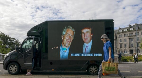 A photograph of US President Donald Trump and convicted child sex offender Jeffrey Epstein is displayed on the side of a van in Aberdeen city centre, during US President Donald Trump's five-day private trip to Scotland. The protest billboard was organised by the group 'Everyone Hates Elon'. Picture date: Monday July 28, 2025. Photo: Jane Barlow/PRESS ASSOCIATION
