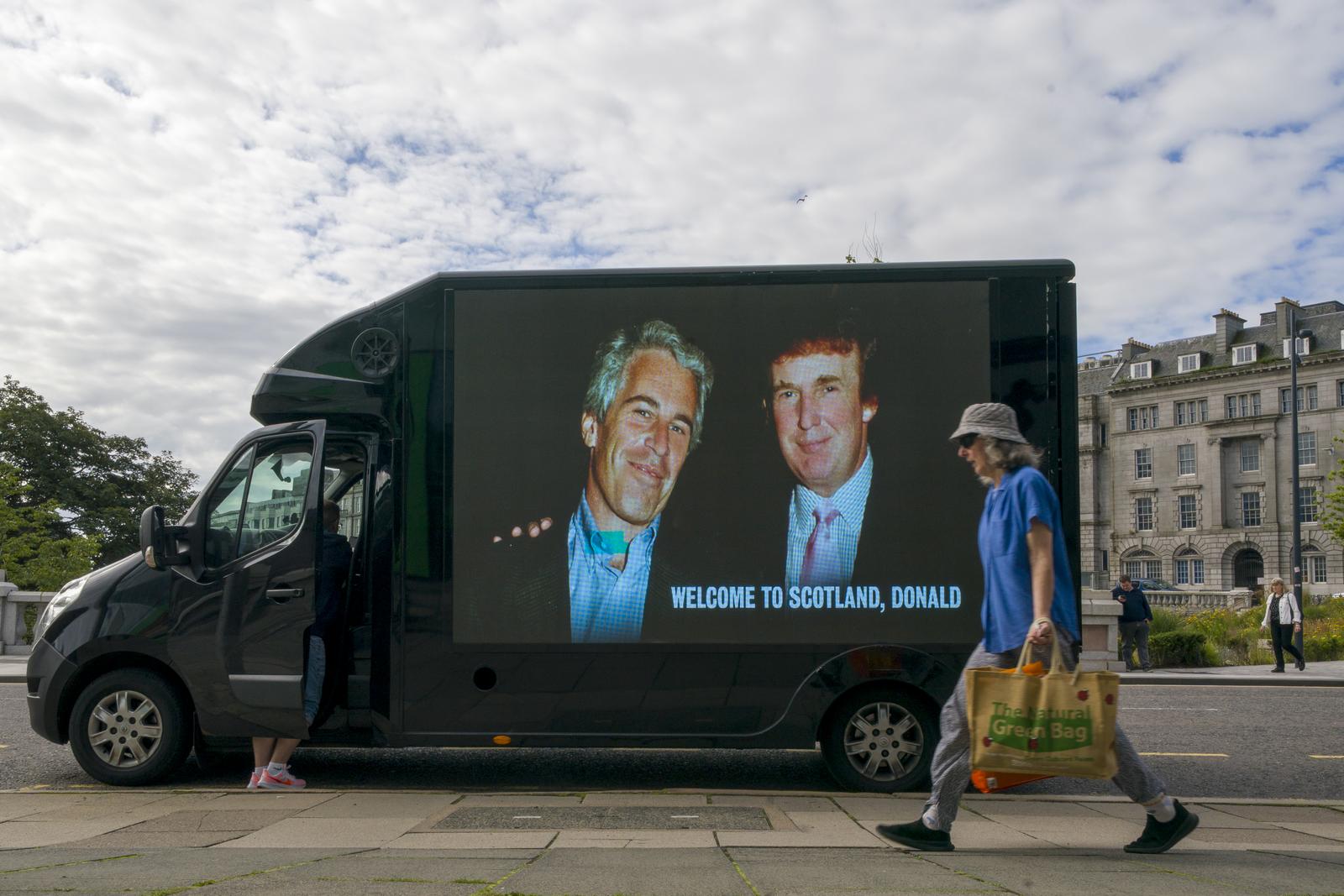 A photograph of US President Donald Trump and convicted child sex offender Jeffrey Epstein is displayed on the side of a van in Aberdeen city centre, during US President Donald Trump's five-day private trip to Scotland. The protest billboard was organised by the group 'Everyone Hates Elon'. Picture date: Monday July 28, 2025. Photo: Jane Barlow/PRESS ASSOCIATION