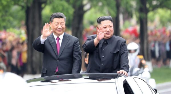 DPRK-PYONGYANG-CHINA-XI JINPING-STATE VISIT (190620) -- PYONGYANG, June 20, 2019 (Xinhua) -- General Secretary of the Central Committee of the Communist Party of China (CPC) and Chinese President Xi Jinping and Kim Jong Un, chairman of the Workers' Party of Korea (WPK) and chairman of the State Affairs Commission of the Democratic People's Republic of Korea (DPRK), ride an open-top vehicle to the square of the Kumsusan Palace of the Sun amid welcoming crowds, following a grand welcoming ceremony held by the DPRK side at the Sunan International Airport, in Pyongyang, DPRK, June 20, 2019. Xi Jinping arrived here Thursday for a state visit to the DPRK. Xi and his wife, Peng Liyuan, were greeted beside the ramp by Kim Jong Un and his wife, Ri Sol Ju. (Xinhua/Ju Peng)  Photo: XINHUA/PIXSELL