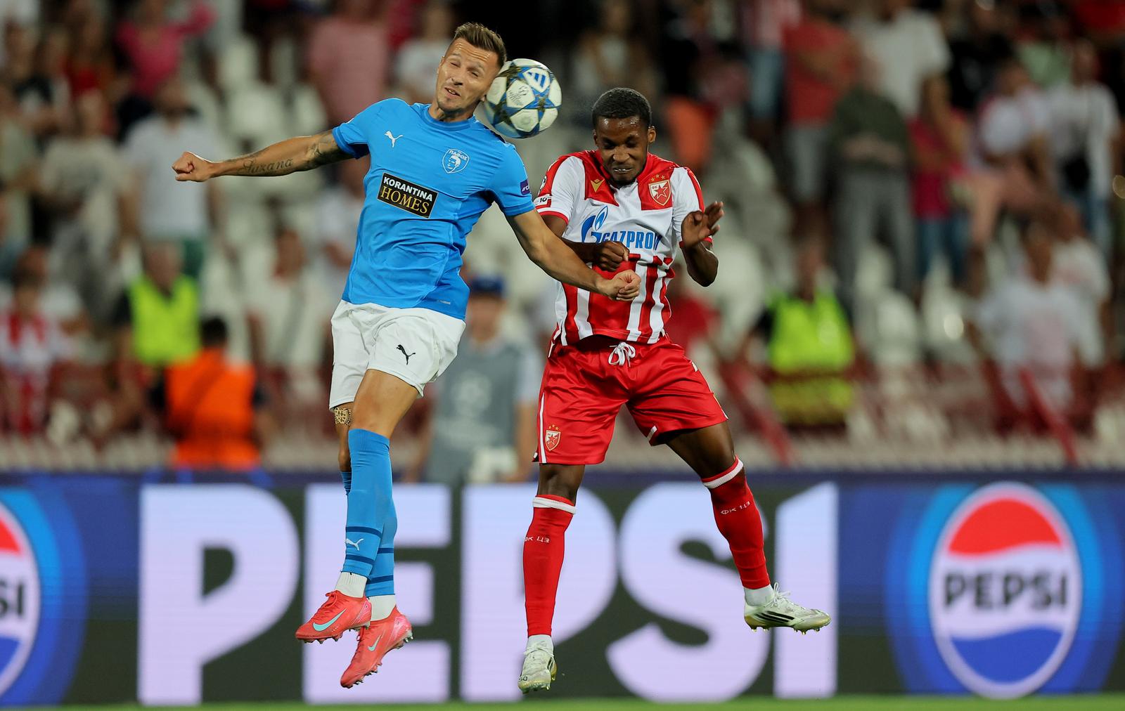 (250820) -- BELGRADE, Aug. 20, 2025 (Xinhua) -- Felicio Milson (R) of Crvena Zvezda vies with Mislav Orsic of Pafos during the UEFA Champions League play-offs 1st leg football match between Crvena Zvezda and Pafos in Belgrade, Serbia, on Aug. 19, 2025. (Photo by Predrag Milosavljevic/Xinhua) Photo: Predrag Milosavljevic/XINHUA