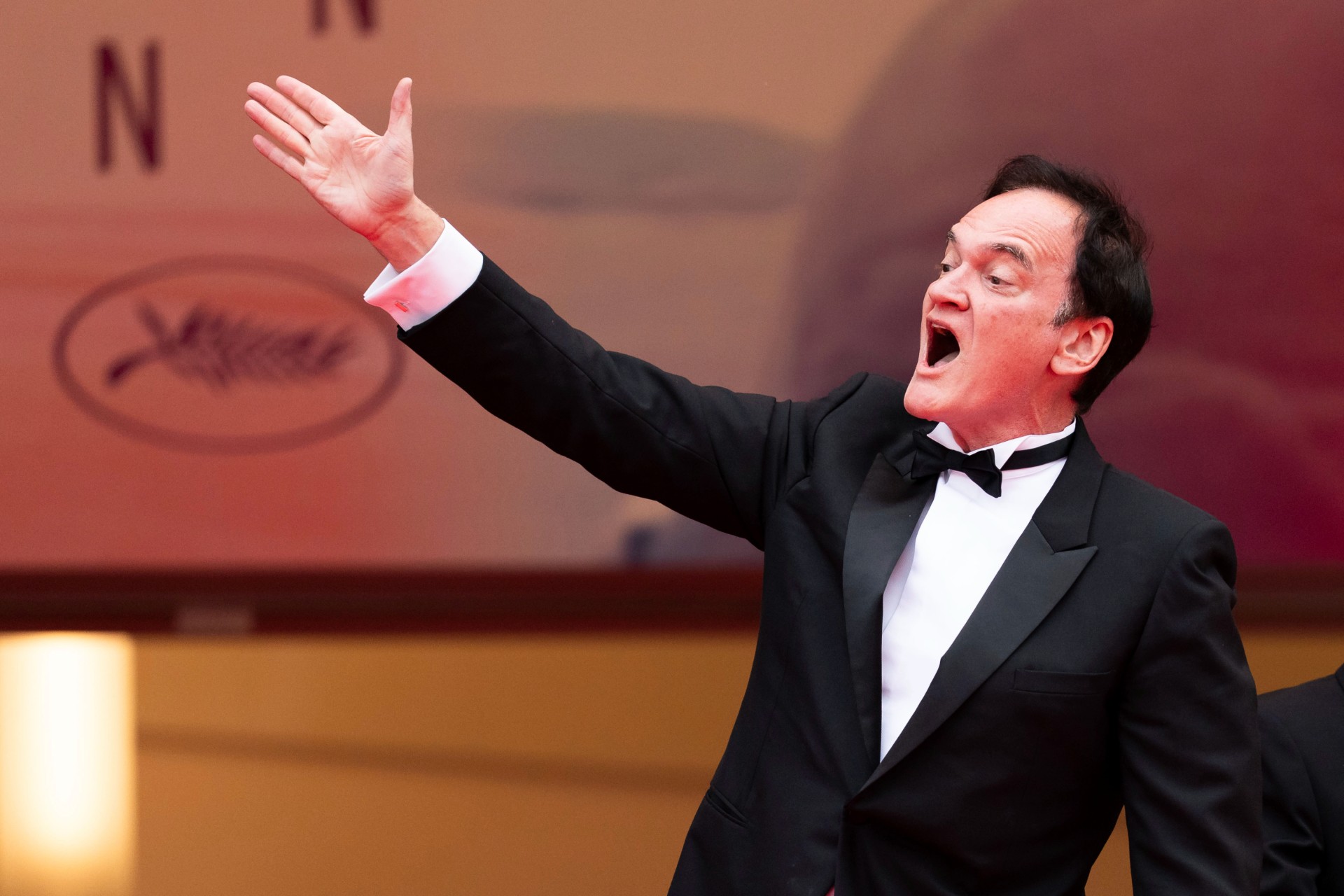 Quentin Tarantino poses for photographers during the opening ceremony red carpet of the 78th international film festival, Cannes, southern France, Tuesday, May 13, 2025. (Photo by Scott A Garfitt/Invision/AP) France Cannes 2025 Opening Ceremony Red Carpet