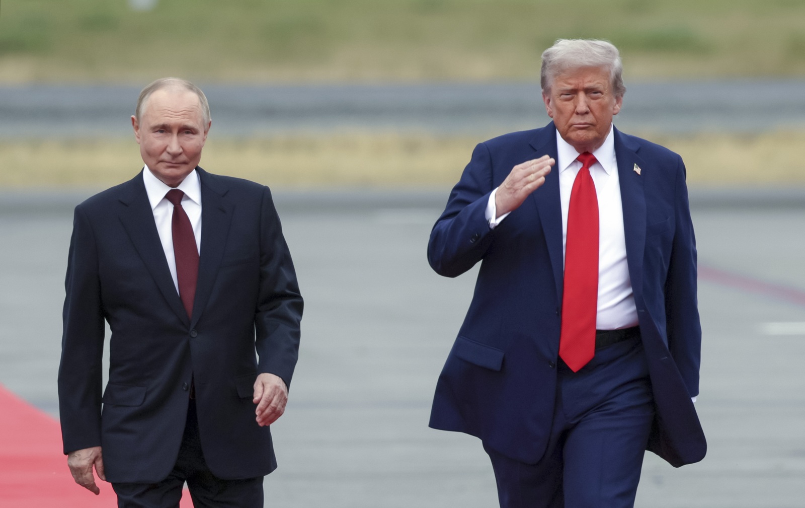 epa12303547 US President Donald Trump (R) welcomes Russian President Vladimir Putin during their meet to negotiate at Joint Base Elmendorf-Richardson in Anchorage, Alaska, USA, 15 August 2025.  EPA/GAVRIIL GRIGOROV/SPUTNIK/KREMLIN POOL / POOL MANDATORY CREDIT