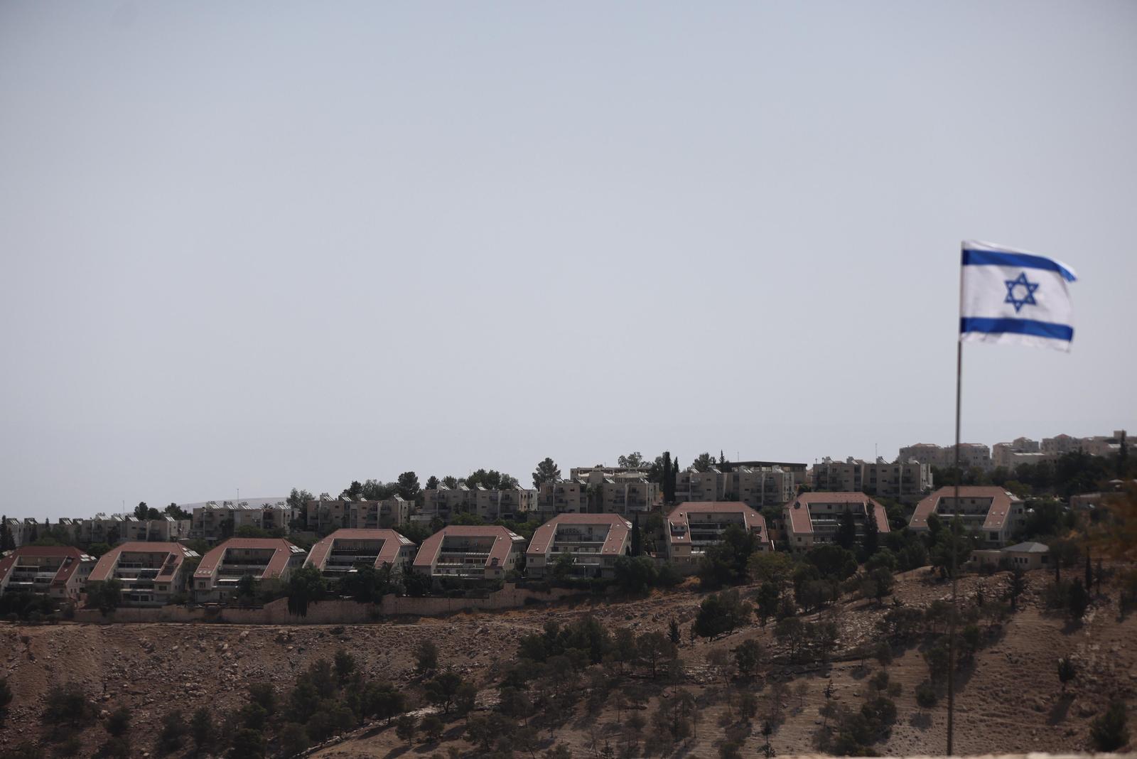 (250815) -- BEIJING, Aug. 15, 2025 (Xinhua) -- This photo taken on Aug. 14, 2025 shows a view of the E1 area, a stretch of land east of Jerusalem between the city and the settlement of Ma'ale Adumim.   Israel's far-right Finance Minister Bezalel Smotrich said Wednesday he has approved the construction of 3,401 housing units for settlers in a particularly controversial area of the occupied West Bank.    The homes would be built in the E1 area. Construction there is seen as especially contentious because it would effectively cut off East Jerusalem from the northern West Bank. Building plans in E1 have been frozen for years, largely due to international opposition.    Smotrich, leader of a pro-settler party in Prime Minister Benjamin Netanyahu's ruling coalition, said the move was also aimed at preventing the establishment of a Palestinian state. (Photo by Jamal Awad/Xinhua) Photo: Jamal Awad/XINHUA