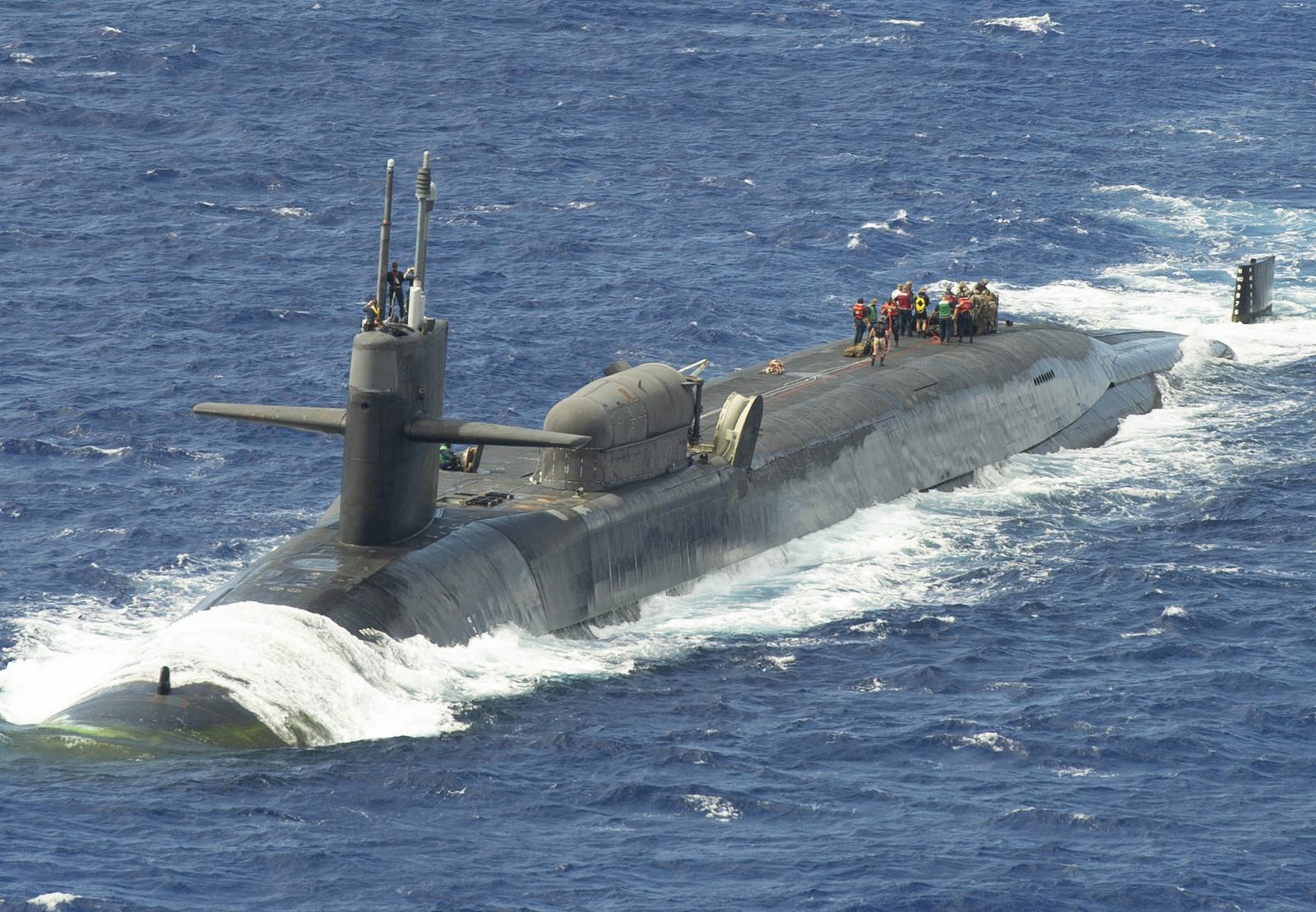 Handout photo dated February 9, 2021 shows marines assigned to the 1st Force Reconnaissance Company, III Marine Expeditionary Force, assemble a combat rubber raiding craft during a scheduled exercise aboard the guided-missile submarine USS Ohio in the Pacific Oxcean. In a rare announcement, the US military said a guided missile submarine has arrived in the Middle East, a message of deterrence clearly directed at regional adversaries as the Biden administration tries to avoid a broader conflict amid the Israel-Hamas war. US Central Command said on social media Sunday that an Ohio-class submarine was entering its area of responsibility. The social media post did not name the sub, but the US Navy has four Ohio-class guided missile submarines, or SSGNs, which are former ballistic missile subs converted to fire Tomahawk cruise missiles rather than nuclear-tipped ballistic missiles. U.S. Navy photo by Mass Communication Specialist 1st Class Juan Antoine King via ABACAPRESS.COM Photo: ABACA/ABACA
