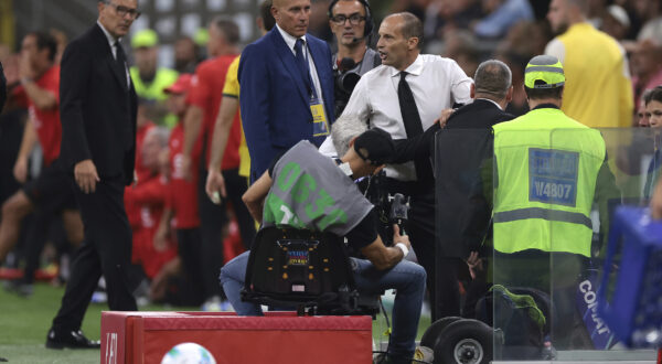 September 14, 2025, Milan: Milan, Italy, 14th September 2025. Massimiliano Allegri Head coach of AC Milan reacts with the Fourth Official Antonio Rapuano after being shown a red card by the Referee Matteo Marcenaro during the AC Milan vs Bologna Serie A match at Giuseppe Meazza, Milan. (Credit Image: Â© Jonathan Moscrop/Sportimage/Cal Sport Media) (Cal Sport Media via AP Images)