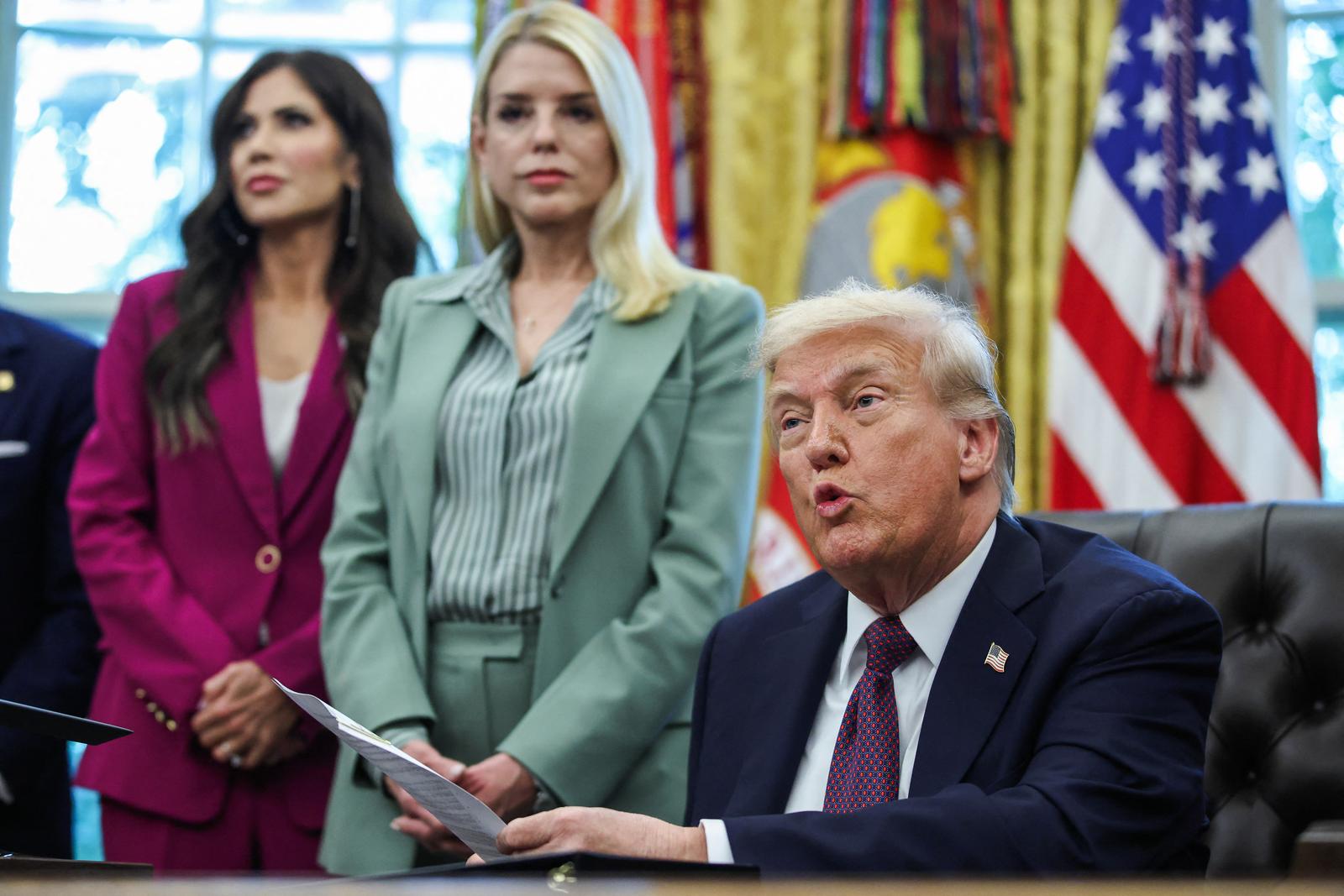 Homeland Security Secretary Kristi Noem and Attorney General Pam Bondi listen as President Donald Trump speaks before signing a Presidential Memorandum in the Oval Office at the White House on September 15, 2025 in Washington, D.C. FBI Director Kash Patel, Homeland Security Secretary Kristi Noem, Attorney General Pam Bondi, Defense Secretary Pete Hegseth, Tennessee Gov. Bill Lee and others were present. (Photo by Samuel Corum/Pool/ABACAPRESS.COM) Photo: Pool/ABACA/ABACA
