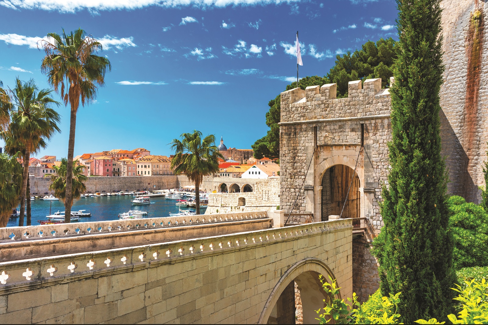 Dubrovnik a city in southern Croatia fronting the Adriatic Sea, Europe. Old city center of famous town Dubrovnik, Croatia. Picturesque view on Dubrovnik old town (medieval Ragusa) and Dalmatian Coast.